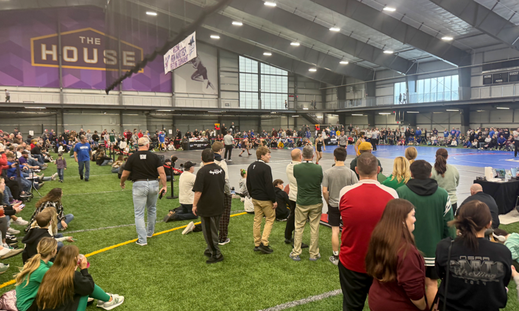 Norm Manstedt Wrestling Invitational Spectators and wrestlers on Day 3 at the Columbus Fieldhouse